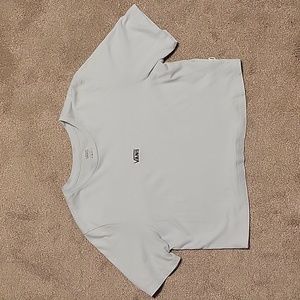 Vans light blue, cropped t-shirt. EUC. Sz large. Perfect condition.